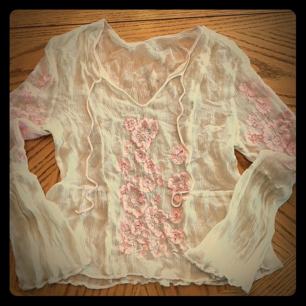 Sheer blouse with appliqués